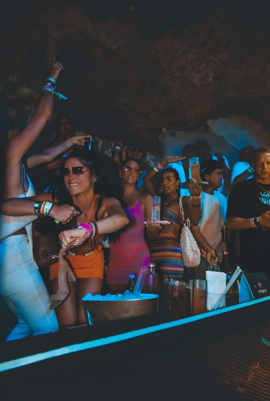a group of people standing next to each other.